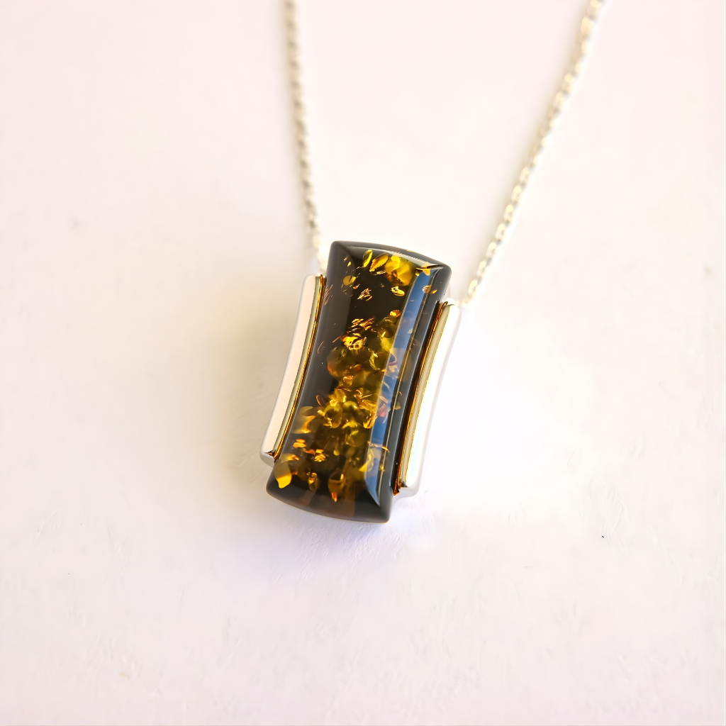 green Amber pendant necklace on a white background