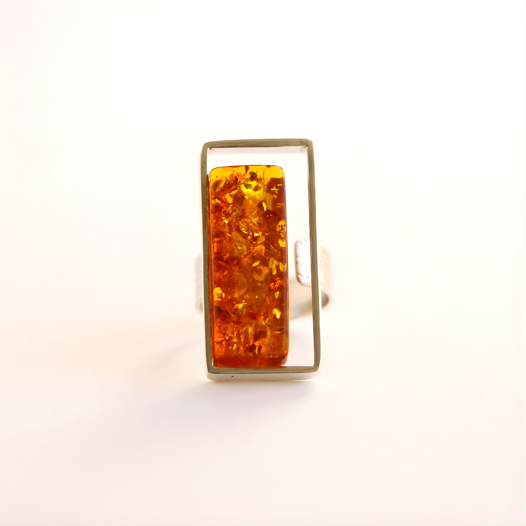 amber Ring with amber stone on a white background