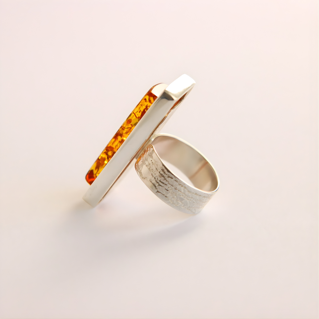 amber ring featuring a amber stone on a light beige background
