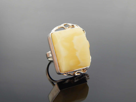 Natural Baltic butterscotch amber ring in 925 sterling silver with avant garde design.
