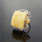 Natural Baltic butterscotch amber ring in 925 sterling silver with twisted design.