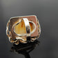 Natural Baltic butterscotch amber avant garde ring with twisted sterling silver band.