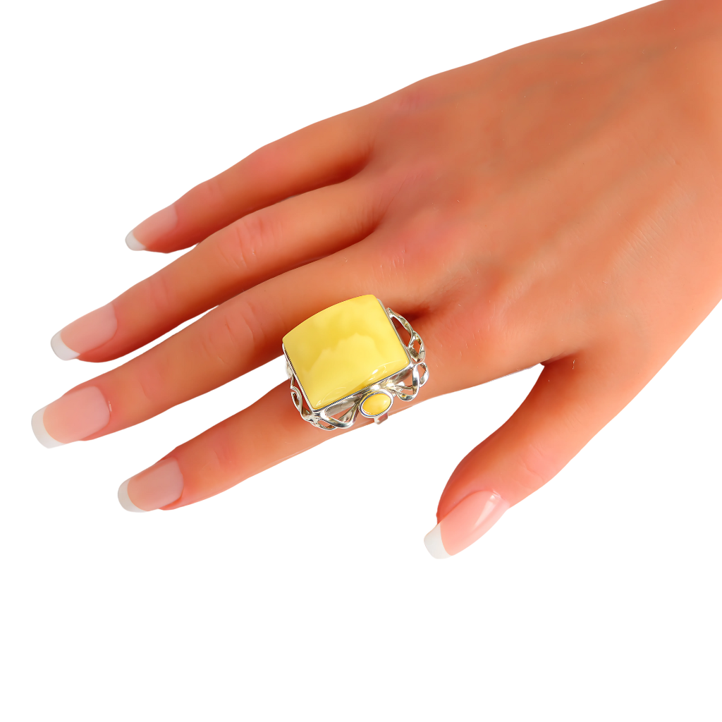 Natural Baltic Butterscotch Amber Avant Garde Ring in 925 Sterling Silver on hand.