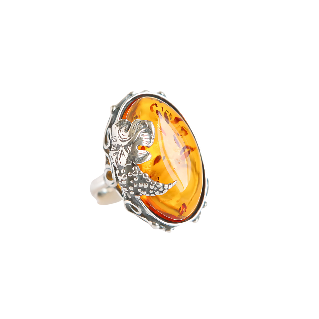 Natural Baltic cognac amber grape leaf statement ring in 925 sterling silver.