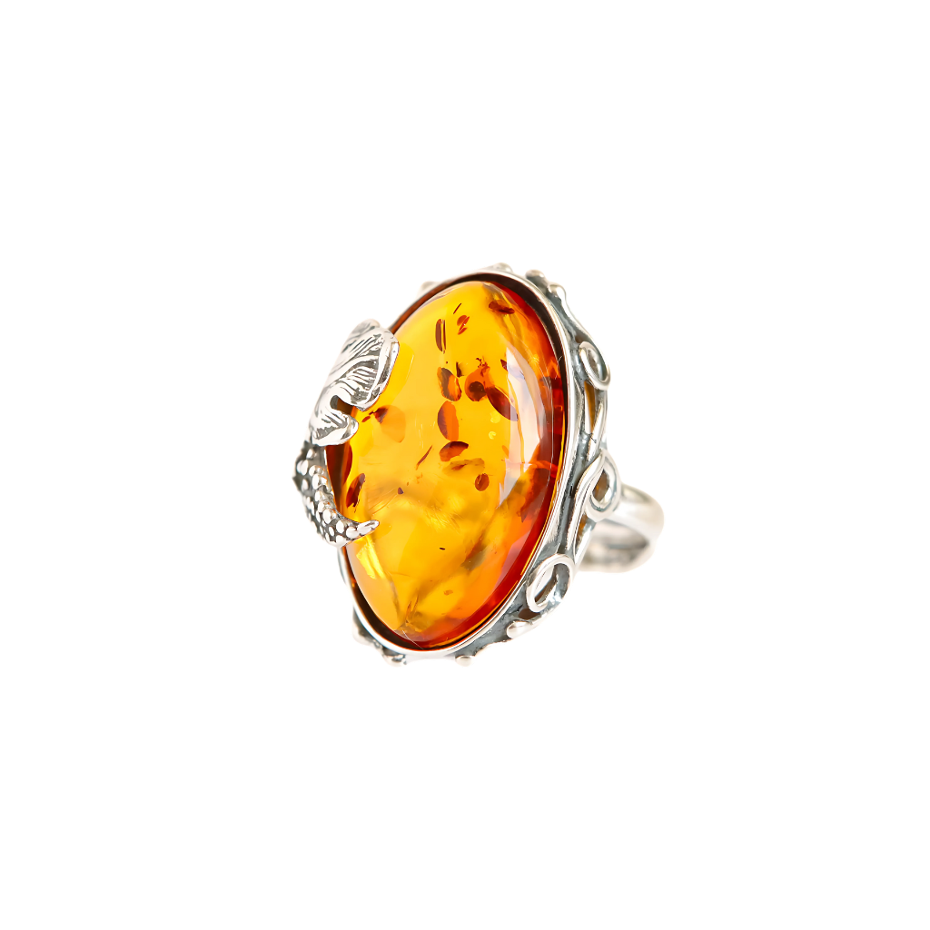 Natural Baltic cognac amber grape leaf statement ring in 925 sterling silver.