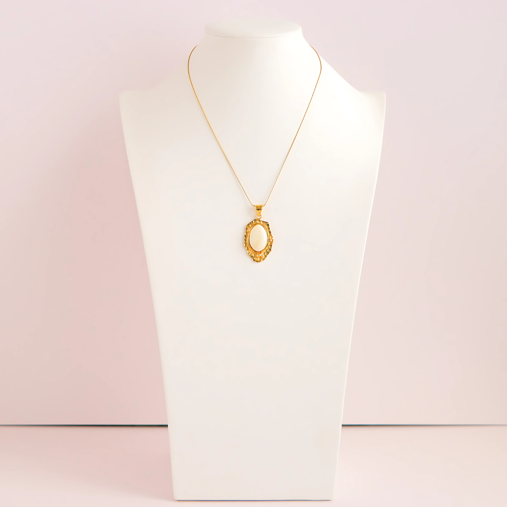 Natural white amber necklace on mannequin 