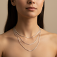 model wearing sterling silver 16, 18, 20 inch box chain necklace on neutral background