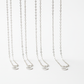 Sterling Silver Cable Chains at different lengths on white background