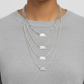model wearing 4 sterling silver chains full length 16, 18, 20, 24 inch lengths.