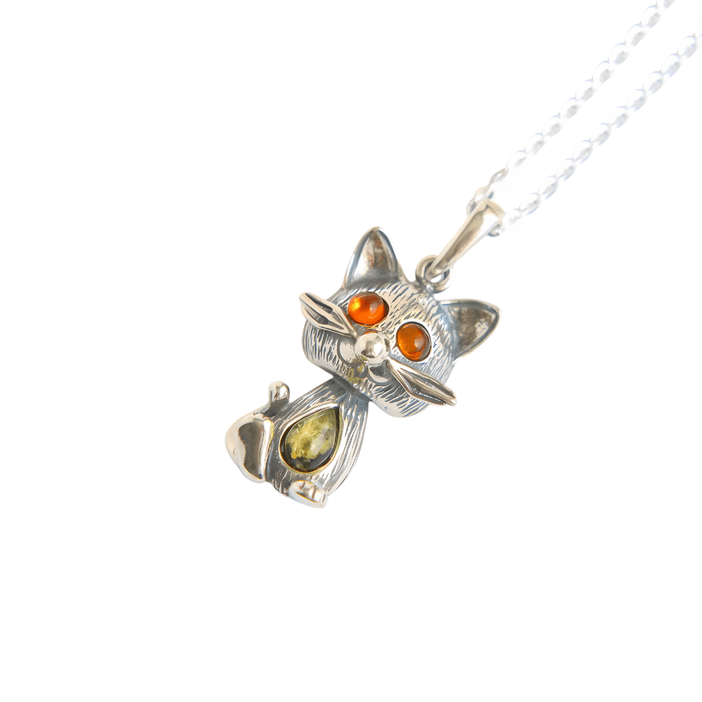 Sterling Silver Cat Pendant with Amber Eyes on 16" chain, featuring Baltic green and cognac amber in a whimsical feline design. Ideal for cat lovers.