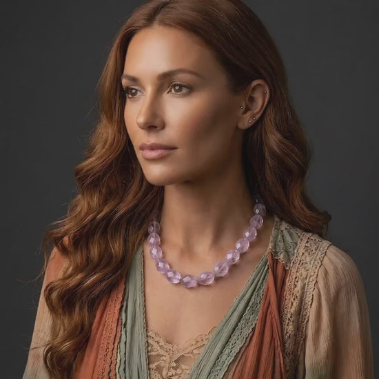 amethyst choker necklace on woman on dark background