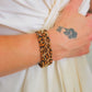 Leopard Print Bracelet on model in white shirt