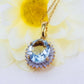 14K yellow gold aquamarine pendant with diamond halo pendant on a 22-inch chain.