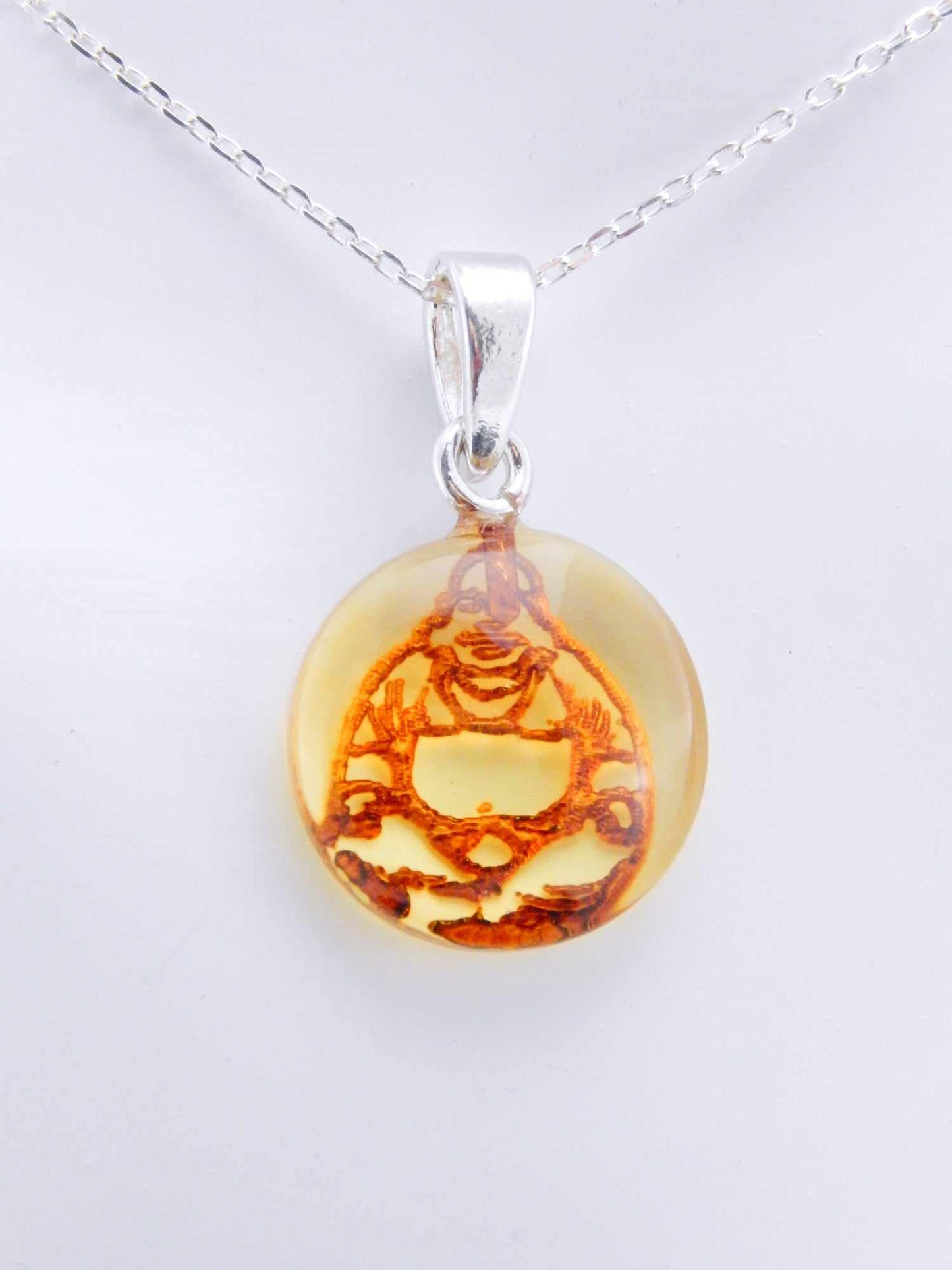Natural Baltic Citrine Amber Buddha pendant choker on a 925 silver chain.