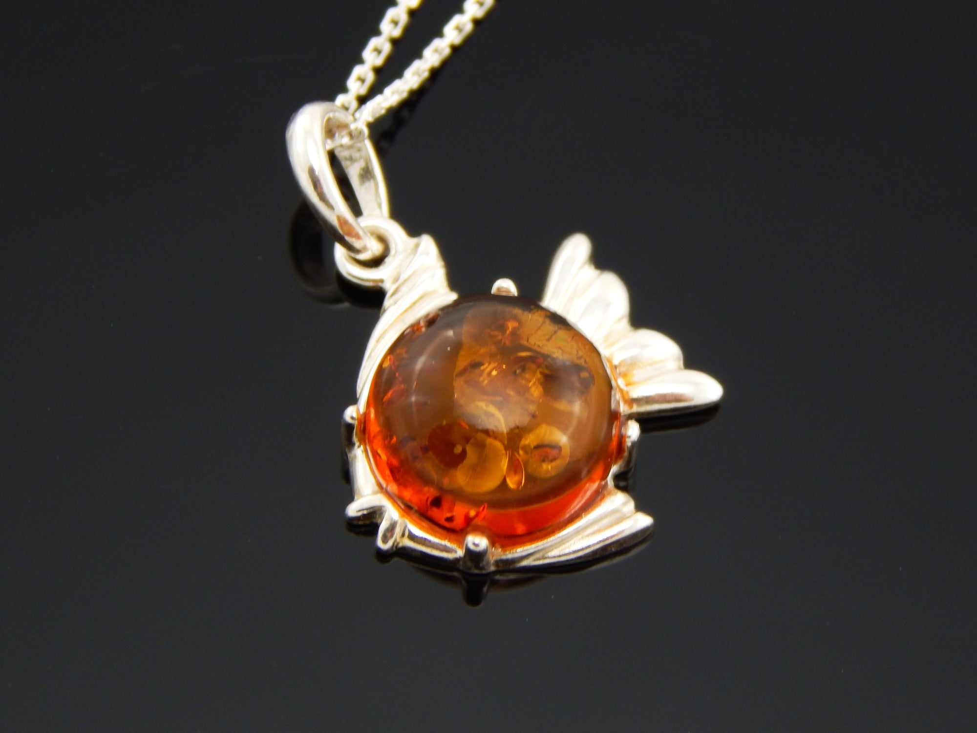 Natural Baltic Cognac Amber Tiny Fish Pendant in 925 Sterling Silver