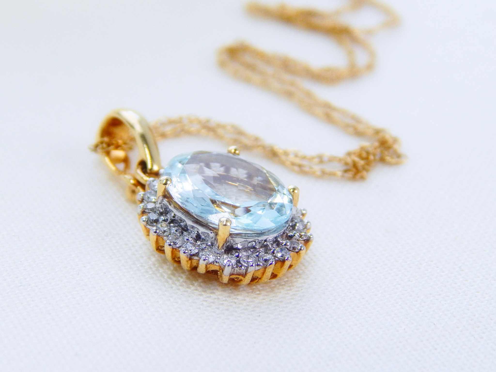 14K Yellow Gold Aquamarine Necklace in Diamond Halo