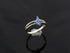 Genuine Kyanite Flower Ring in 925 Sterling Silver with marquise cut gemstones and split band.