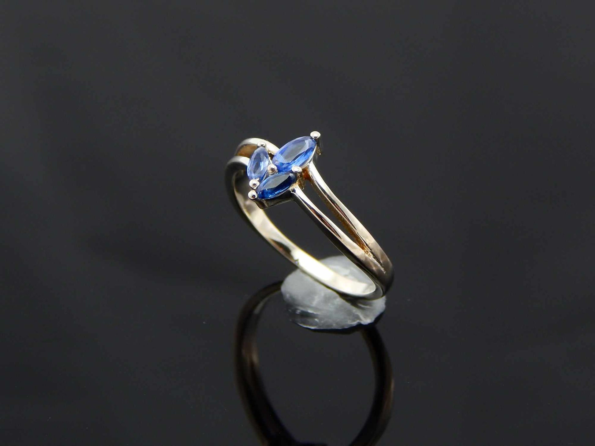 Genuine Kyanite Flower Ring in 925 Sterling Silver with marquise cut gemstones.