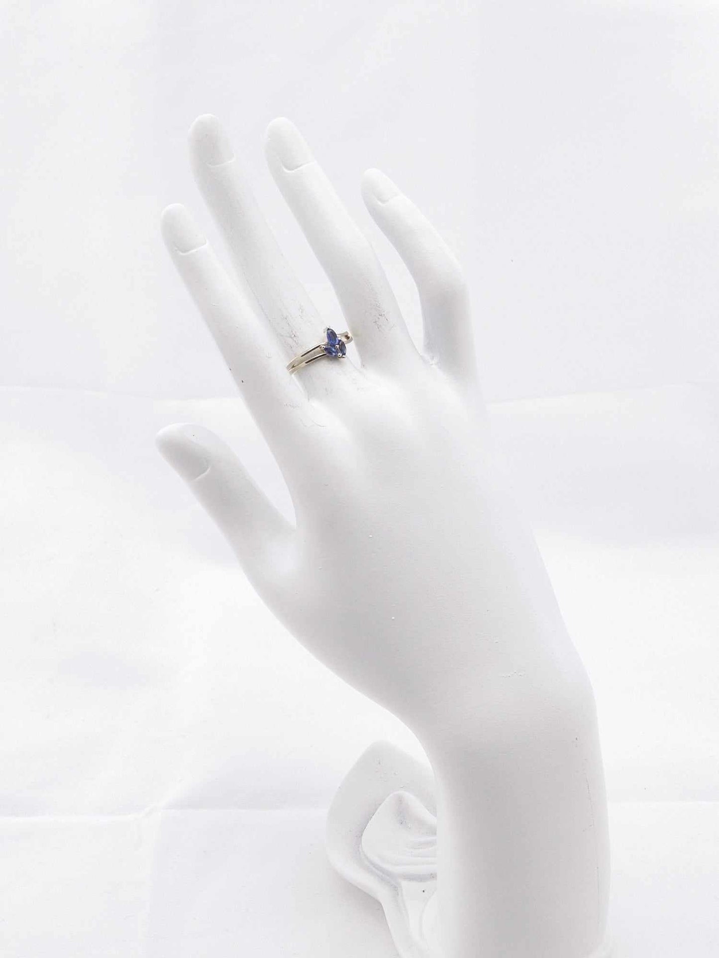 Genuine Kyanite Flower Ring in 925 Sterling Silver on display mannequin hand.