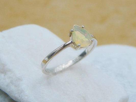 Genuine Opal Pear Cut Ring in 925 Silver with a faceted teardrop opal set on a polished silver band, ideal for minimalist jewelry lovers.