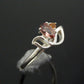 Genuine pink and orange tourmaline flower ring in 925 silver with faceted gemstones.