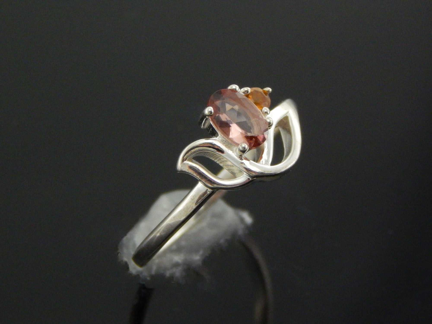 Genuine pink and orange tourmaline flower ring in 925 silver with faceted gemstones.