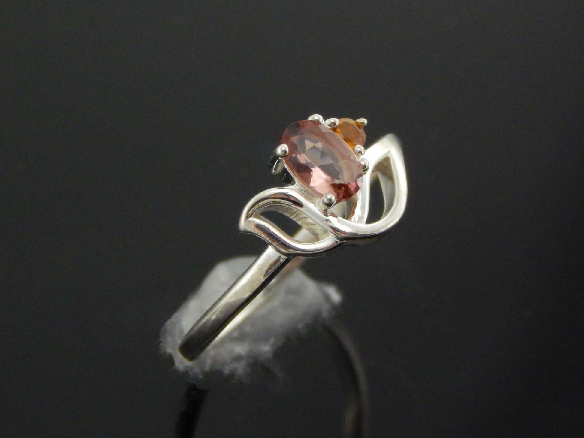 Genuine pink and orange tourmaline flower ring in 925 silver with faceted gemstones.