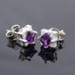 Cushion cut amethyst sterling silver stud earrings with cubic zirconia.