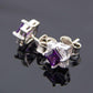 Genuine purple amethyst cushion cut stud earrings in sterling silver with cubic zirconia.